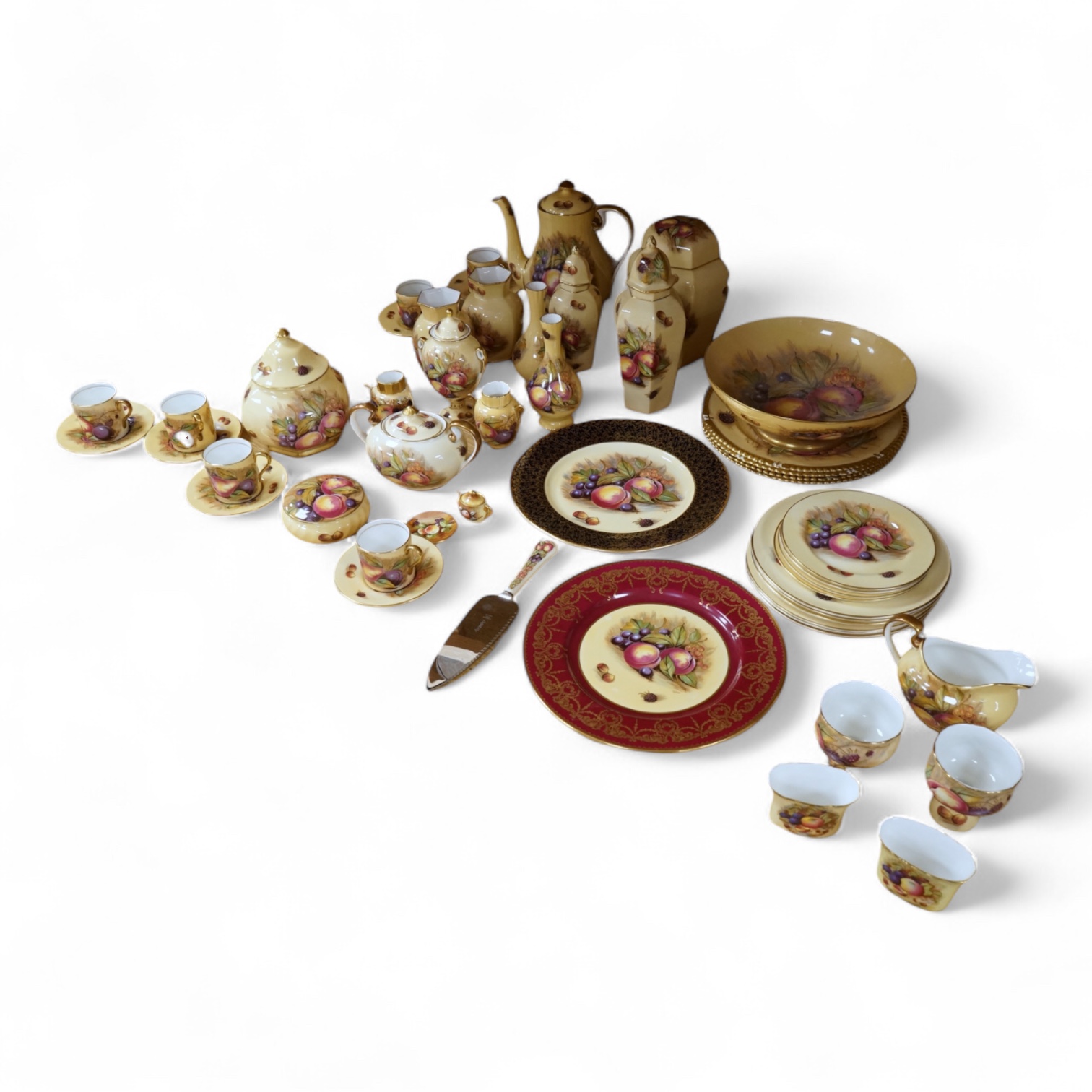 A collection of Aynsley ‘Orchard Gold’ fruit-painted tea/dinner wares and vases, largely signed by D Jones, largest 26cm in diameter